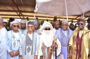 The governor, the emir and other dignitaries watching the great show with interest
